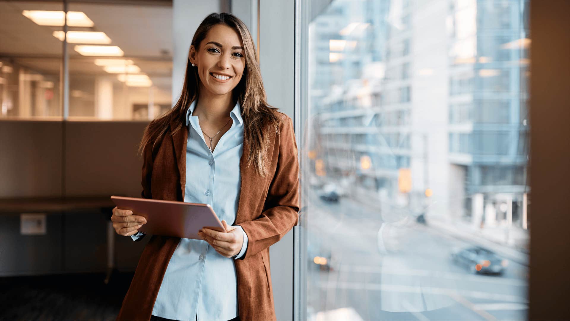 smiling young professional woman decides which mindset to live by