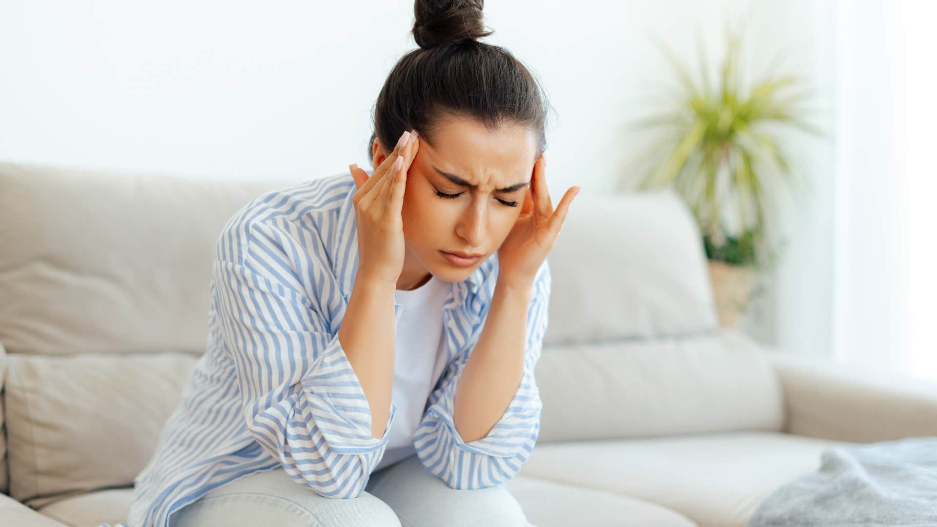 young woman stressed out not feeling good about herself