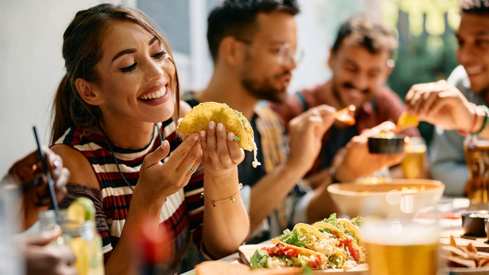 woman enjoying a taco 