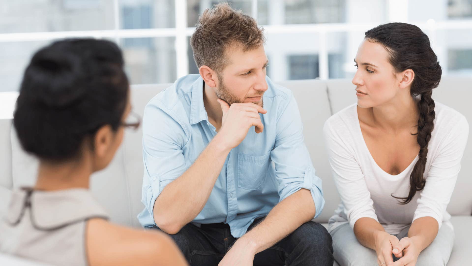 couple attending therapy to help their relationship