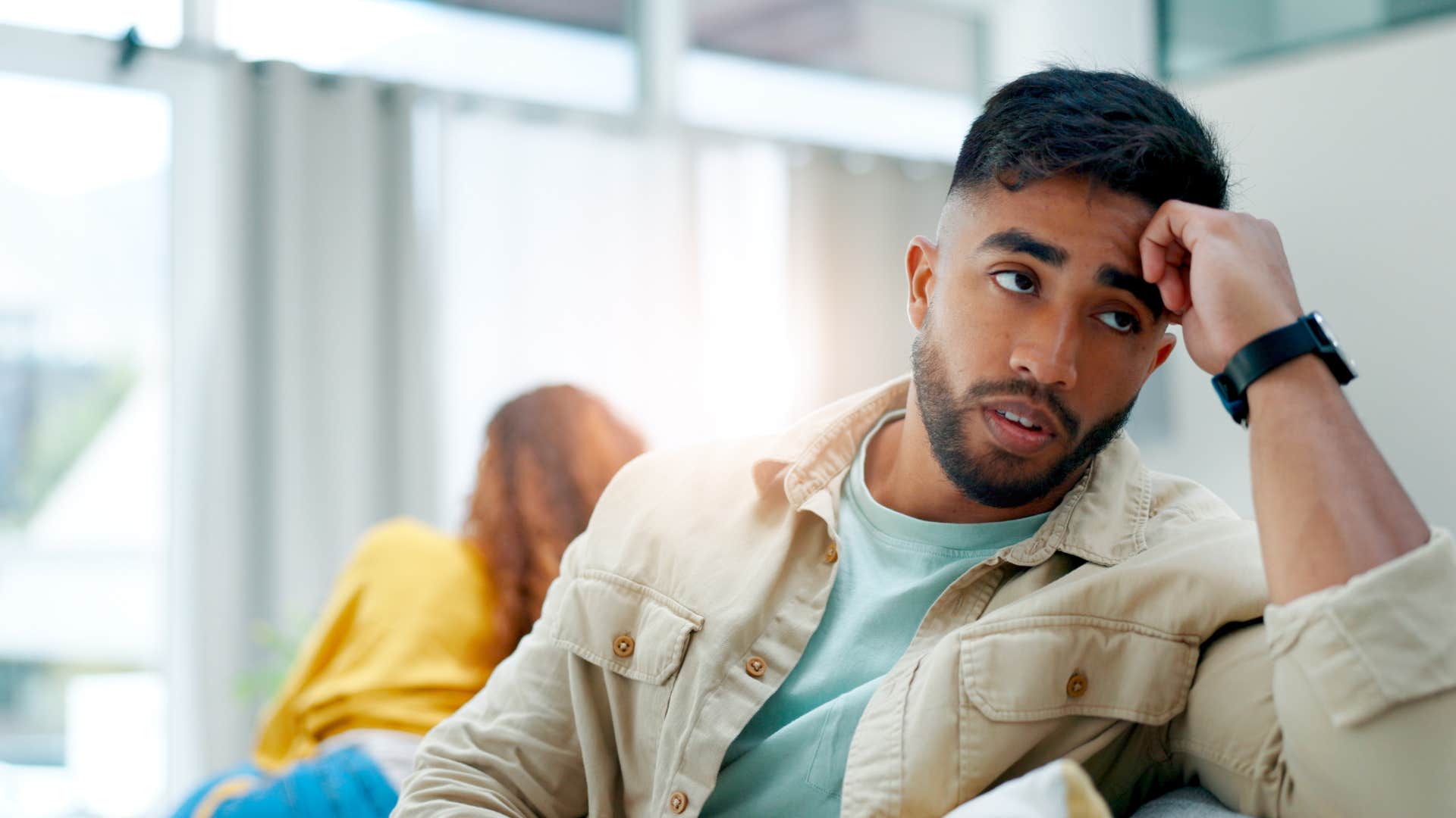 man holding back from sharing good news feeling like people don't like him