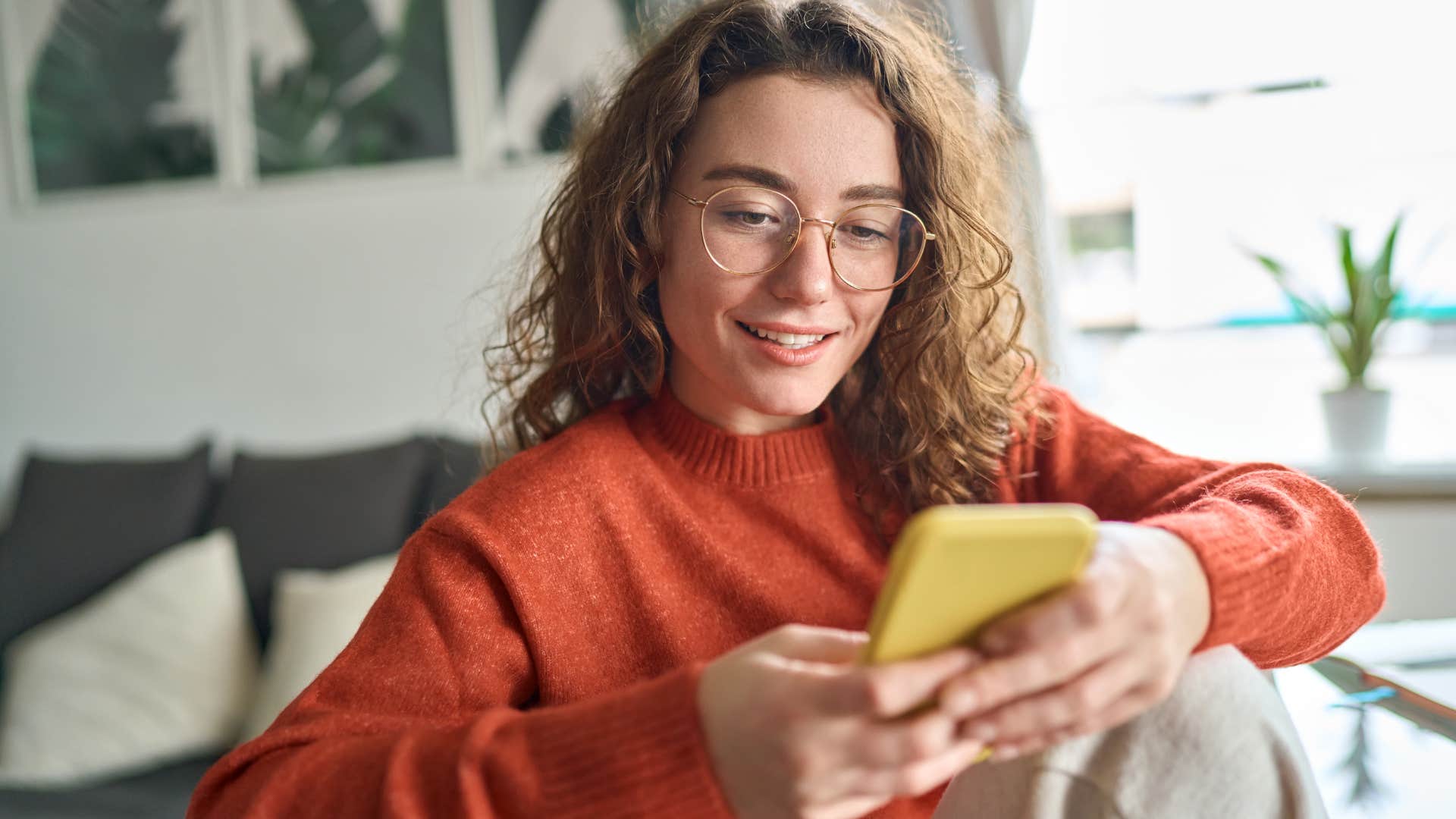 woman with a phone dependency scrolling on her device