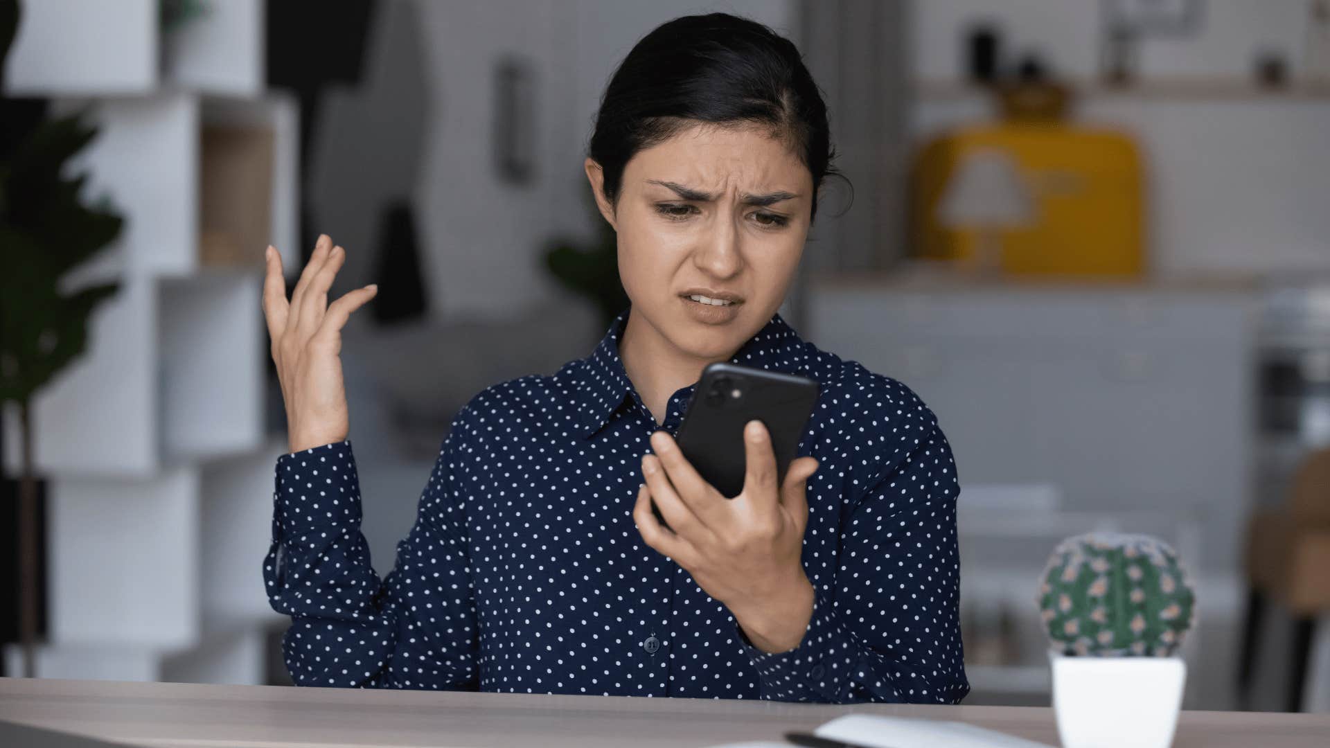 Woman who is seriously overwhelmed and exhausted overreacts to her phone