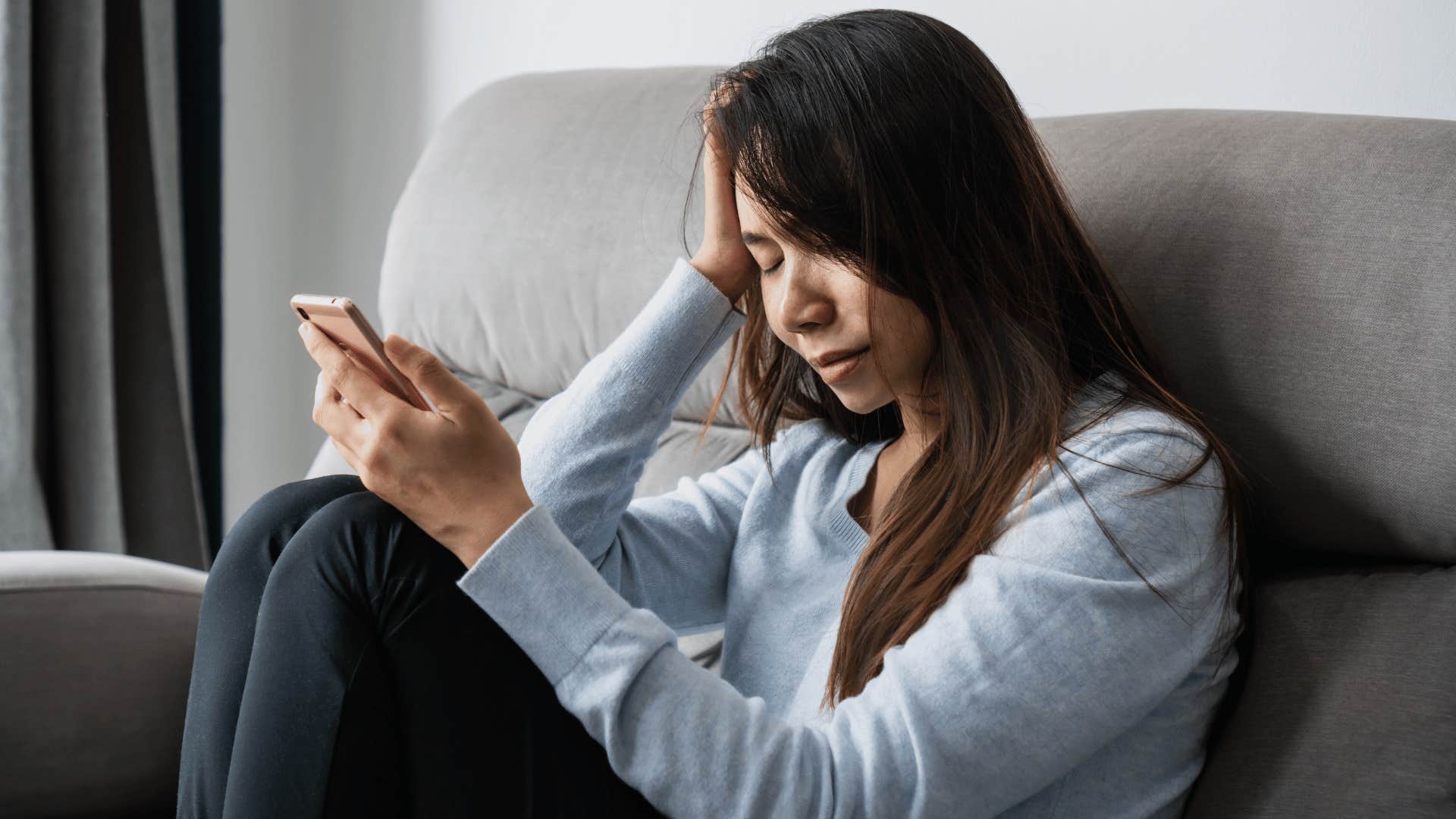 sad woman comparing her marriage to those she sees on social media