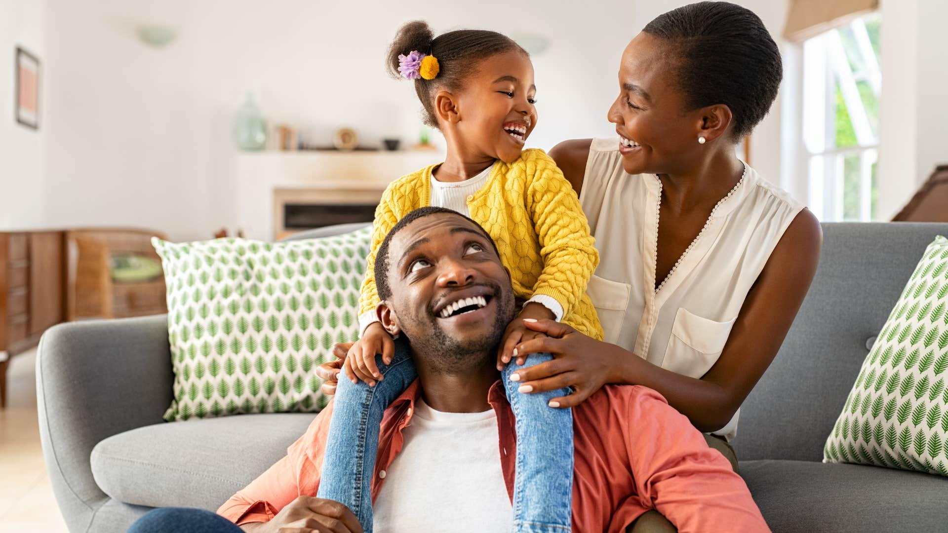 family focusing on finding meaning smiling hugging