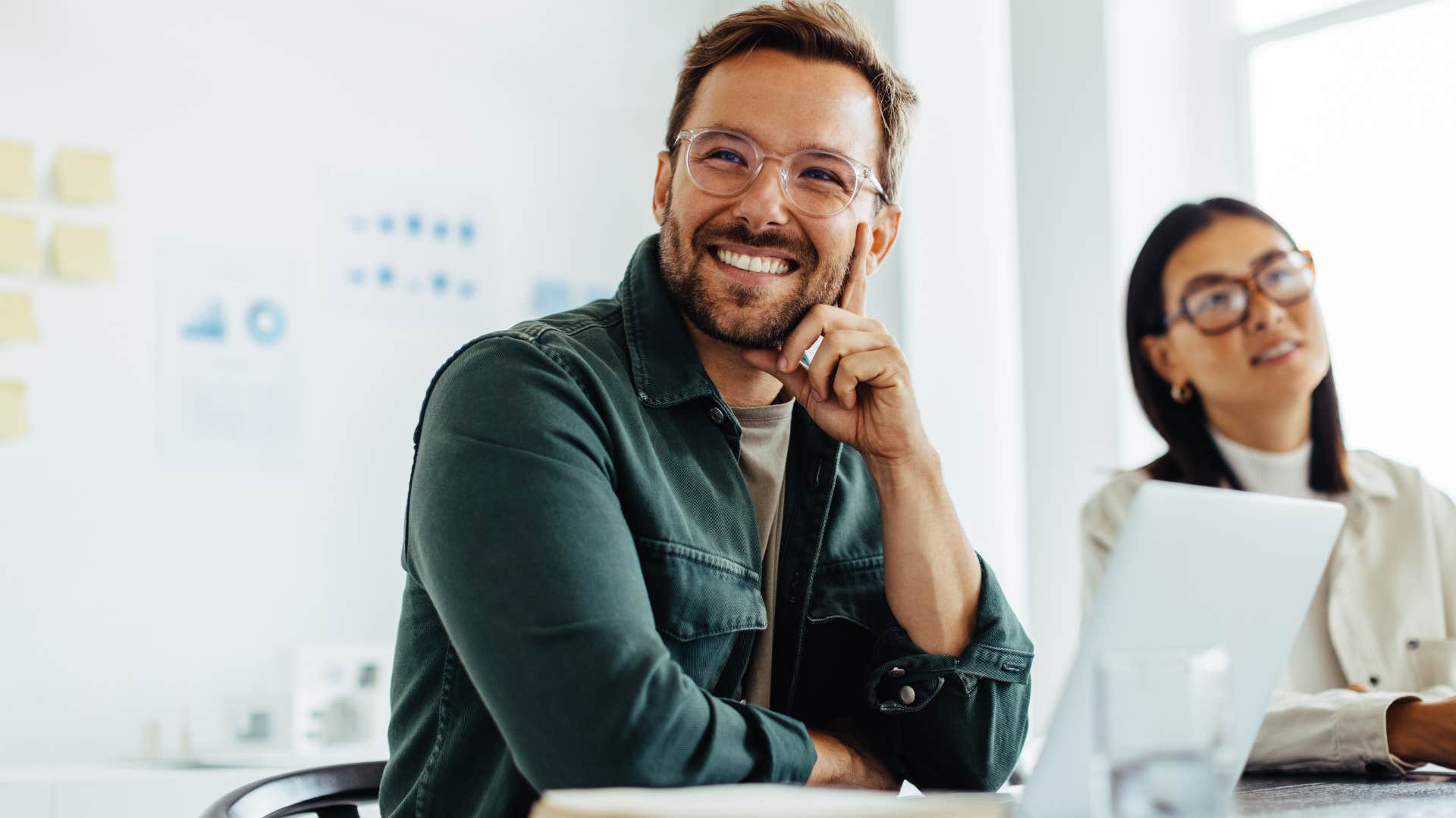 happy man focusing on the positives at work