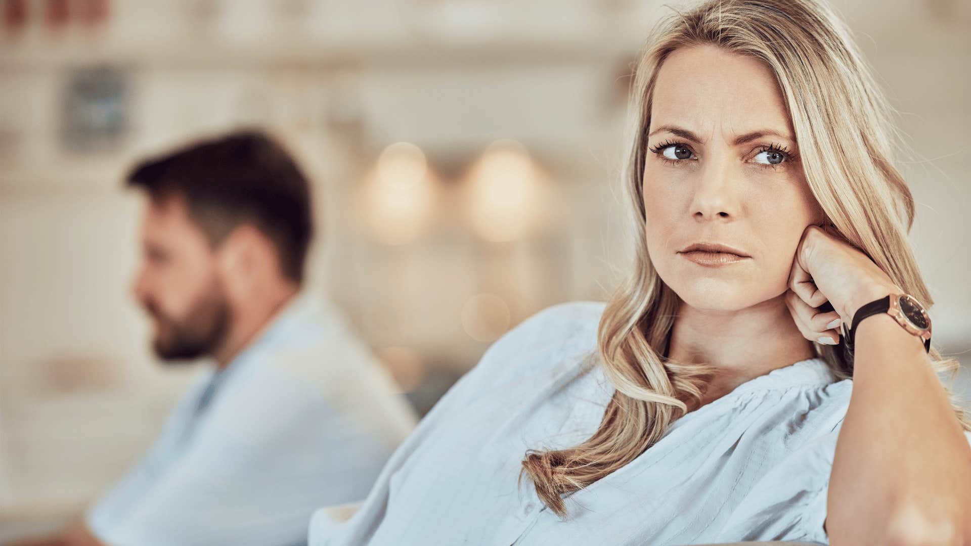 Man looks away from a woman he probably shouldn't marry 